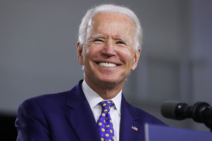 Democratic presidential candidate and former Vice President Joe Biden smiles during an event to announce his plans to combat racial inequality in Wilmington, Delaware, U.S., July 28, 2020. REUTERS/Jonathan Ernst
