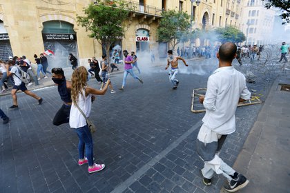 Las corridas en las calles (REUTERS/Thaier Al-Sudani)
