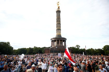 People attend a rally against the government's restrictions following the coronavirus disease (COVID-19) outbreak, in Berlin, Germany August 29, 2020. REUTERS/Axel Schmidt