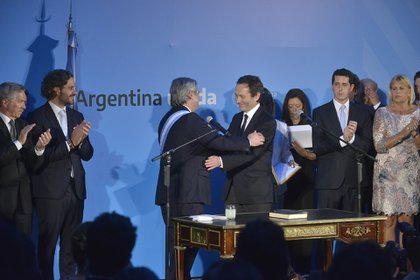 El presidente argentino, Alberto Fernández, y su candidato Gustavo Béliz el día que el mandatario asumió el poder, en diciembre de 2019 (Gustavo Gavotti)