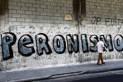 Graffiti firmado por la "JP (Juventud Peronista) Evita" en el Conurbano bonaerense