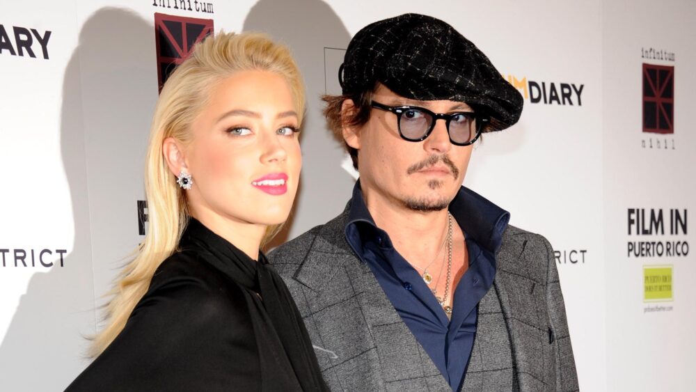 Amber Heard y Johnny Depp cuando todavía no se conocía la relación tóxica que estaban viviendo (Kevin Mazur/WireImage)