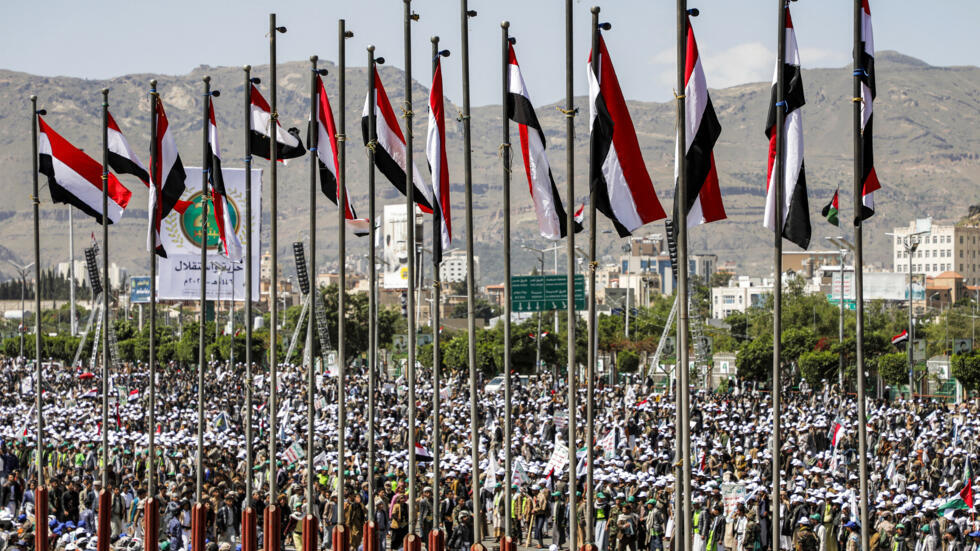 Fighters loyal to Yemen's Huthi group march in a military parade marking the anniversary of the Huthis' 2014 takeover of the capital Sanaa and in solidarity with the Palestinian people, in Sanaa on Se