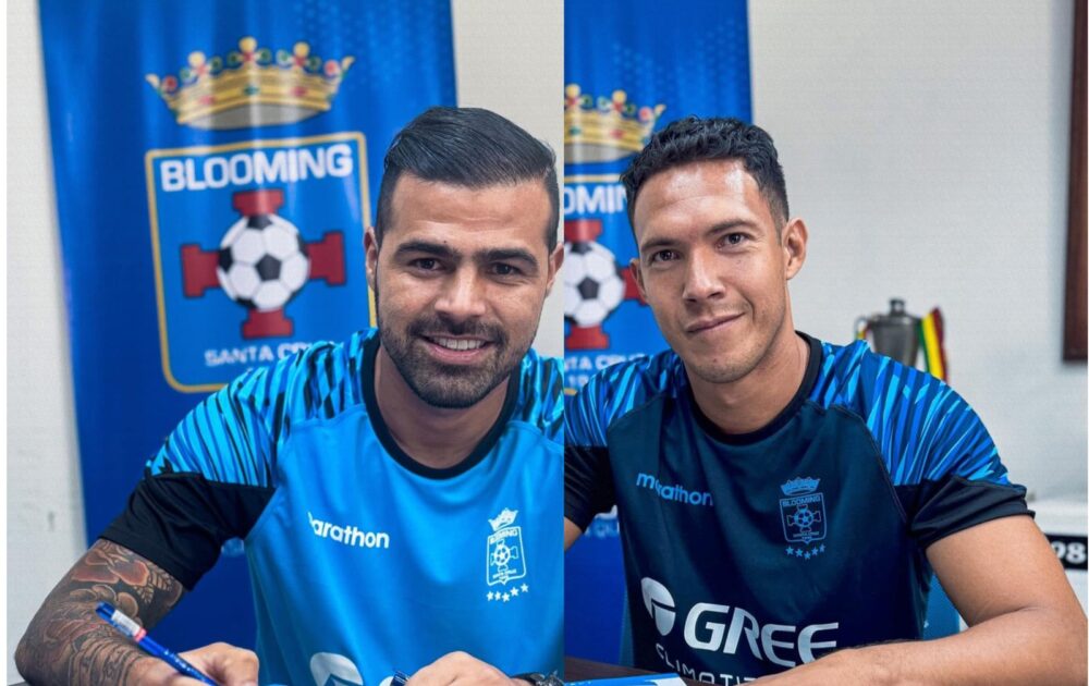 Alaníz y Almada en la firma de contrato. 